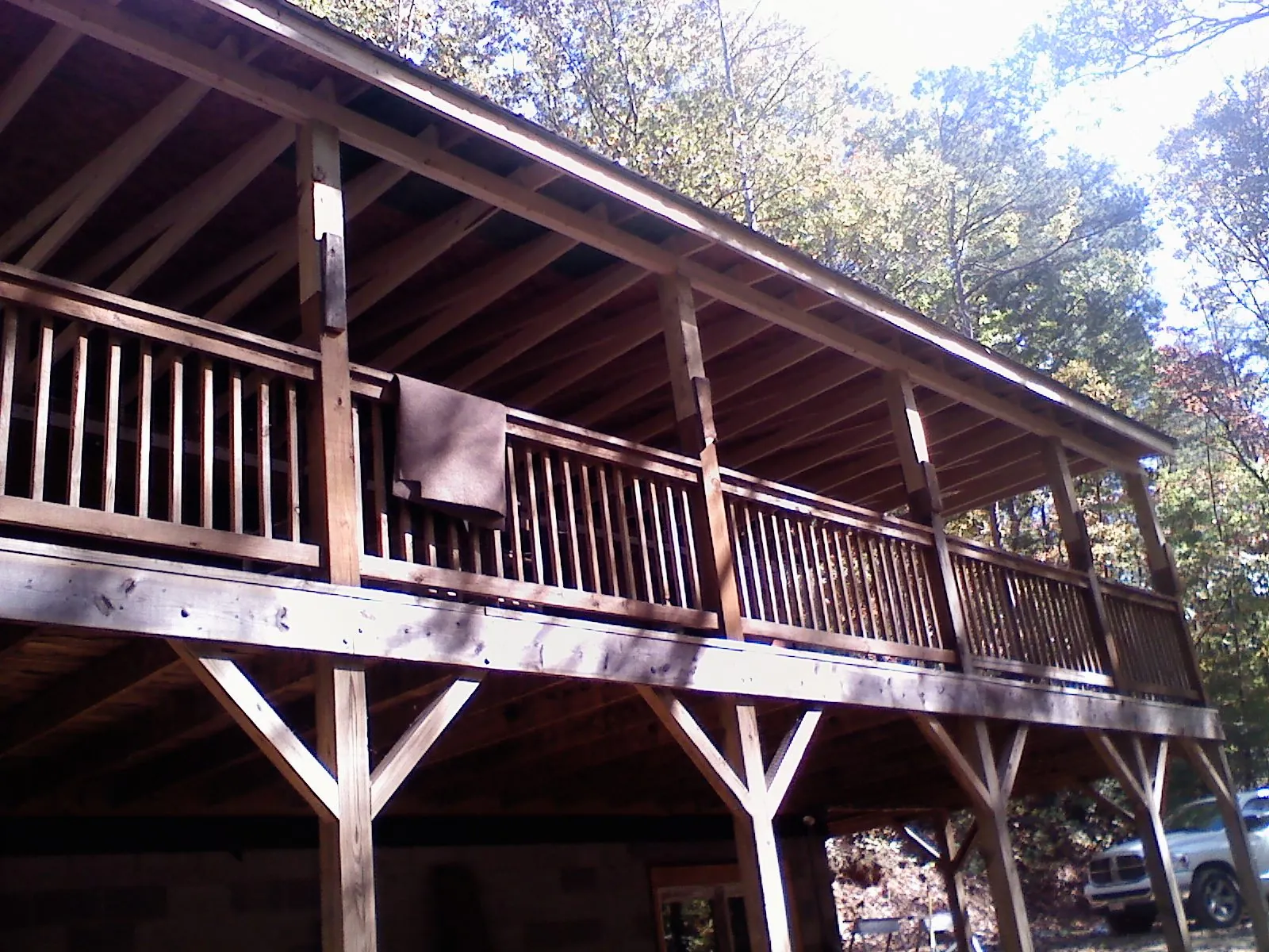 Timber framing under a new elevated porch and deck — Roof Leak Repair in Leonardo by Roofing Brothers